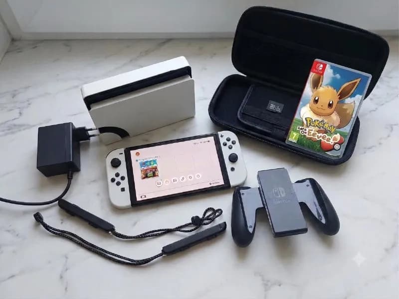 Nintendo Switch OLED в идеальном белом цвете! Состояние пушка, комплект как на фото + классные бонус — Батуми — 650 ₾