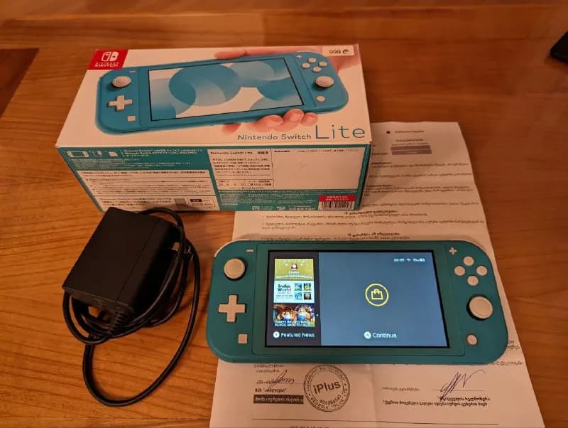Nintendo Switch Lite + microSD 128gb. — Тбилиси — 600 ₾