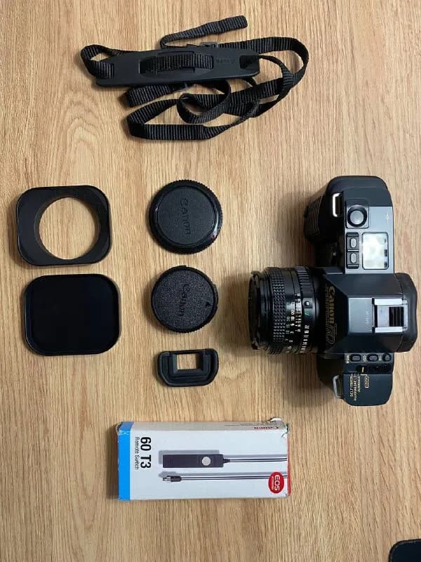 Canon T70, Canon FD 50 mm 1.8, бленда металическая на объектив 52 мм, remote switch 60 T3, все крышки — Тбилиси