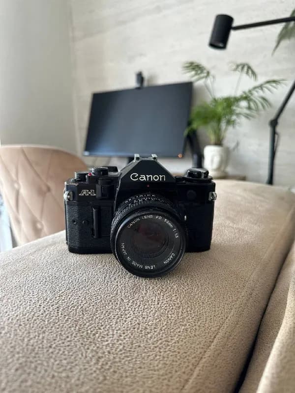 Canon A1. В рабочем состоянии, с родной линзой и uv фильтром. — Тбилиси — 250 ₾